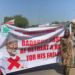 Protesters Overwhelm National Assembly, Days After Kaduna Airstrike