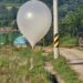 North Korea’s Trash Balloons Ignite Rooftop Fire, Disrupts Seoul Flights