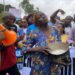 Woman Protests with Empty Pot: A Stark Symbol of Nigeria’s Hardship