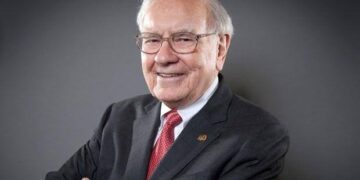 Warren Buffet’s Berkshire Slashes Stake By Half