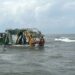 Navy Rescues 59 from Stranded Dredging Vessel, Officer Dies