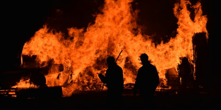 Los Angeles Firefighters Battle Wildfires as Severe Winds Loom