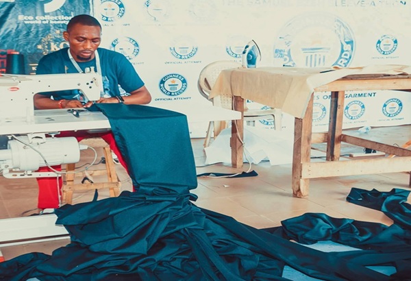 Nigerian Designer Breaks Guinness World Record With Longest-Sleeved Robe