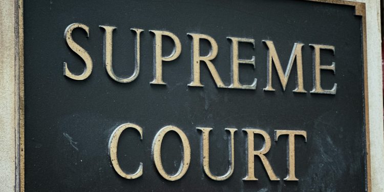 Will Supreme Court Save Trump's Tariffs? DOJ Faces Tough Legal Questions on Presidential Power