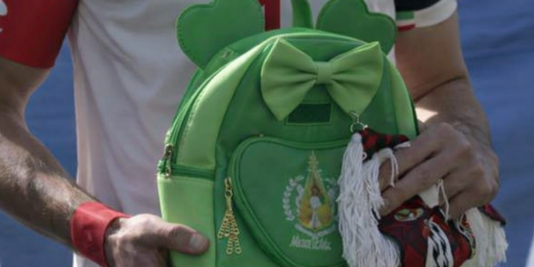 Iranian Soccer Players Hold Schoolbags in Solidarity with Slain Girls