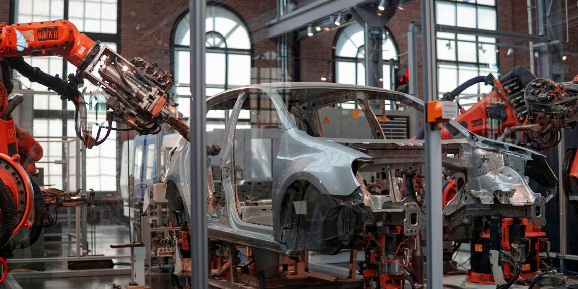 GM Replaces Over 1,000 Human Workers with 50 Robots at Michigan Plant