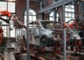 GM Replaces Over 1,000 Human Workers with 50 Robots at Michigan Plant
