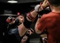 Max Holloway Drains the Conor McGregor Comeback Early with a Knee Injury on UFC 329