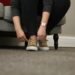 ‘New Humiliation’: Advocates React As ICE Places Ankle Monitors On Springfield Haitians